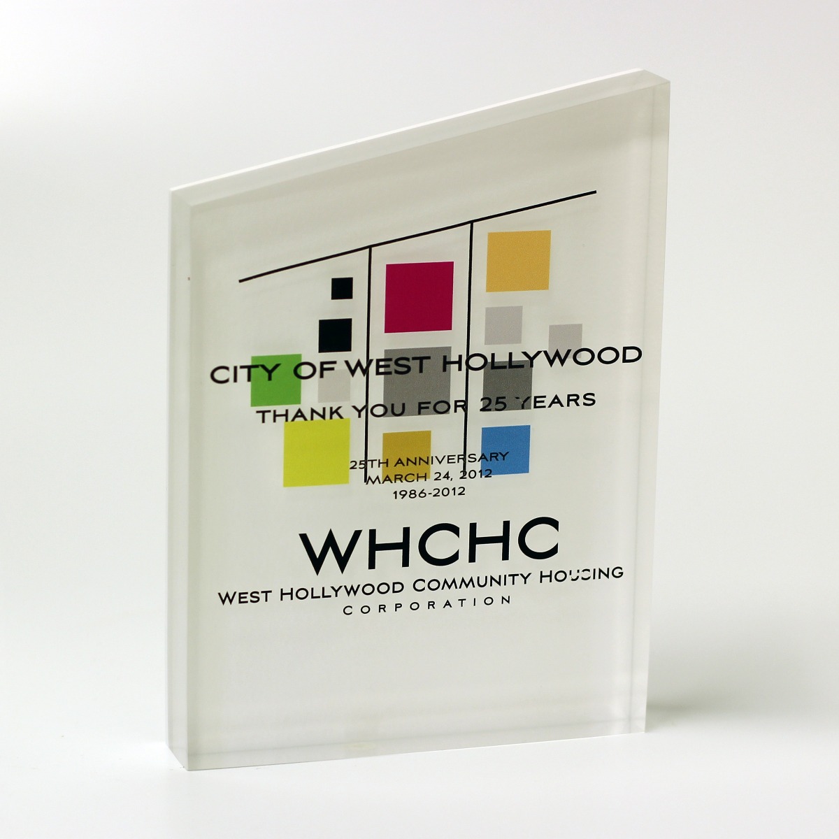 3 dimensional Lucite award with custom shape and slanted roof 