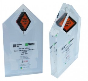 Custom shaped interactive motion Lucite award or trophy with diamond shaped spinner