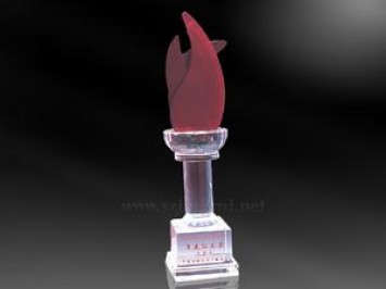 Crystal flame award on pedestal