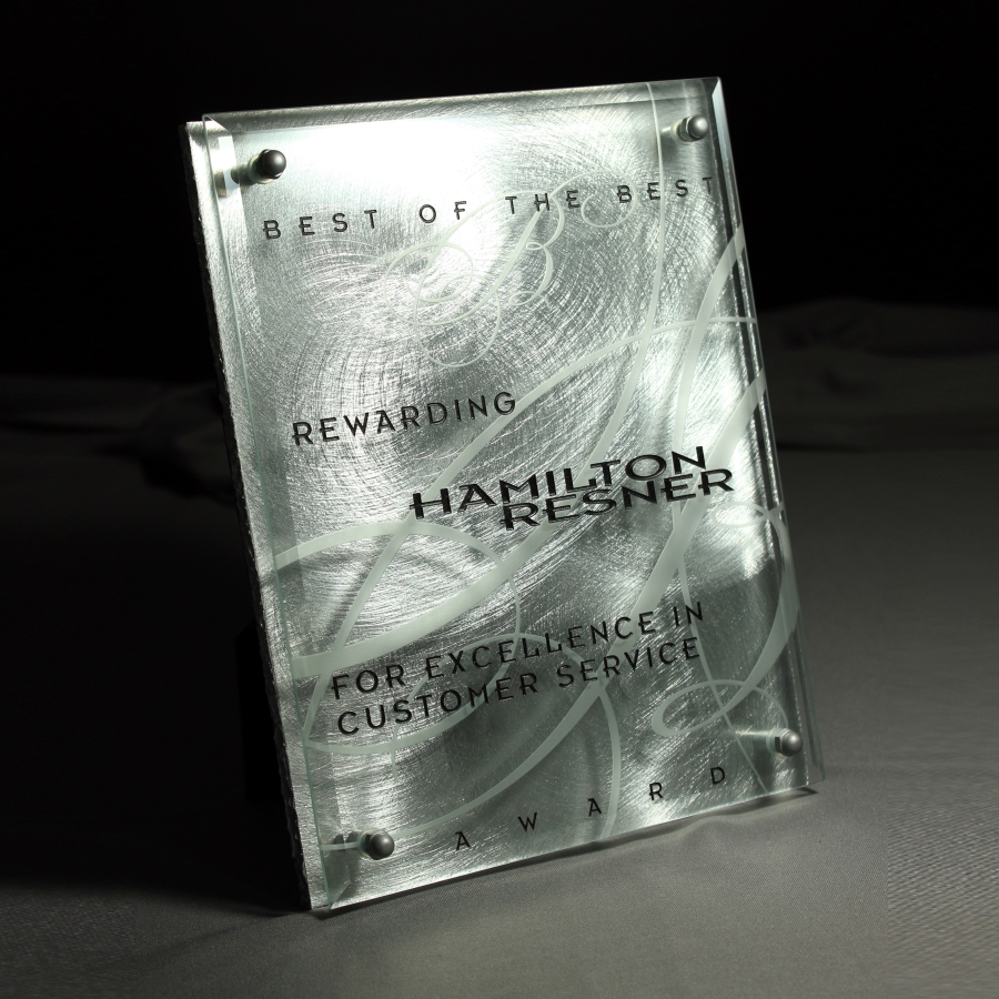 Custom crystal bolted to textured base award plaque
