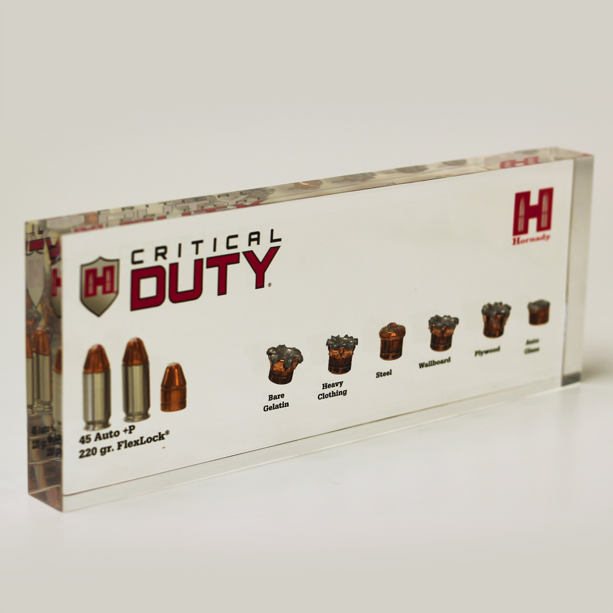 Custom Lucite awards with embedded bullets gun shop promotion