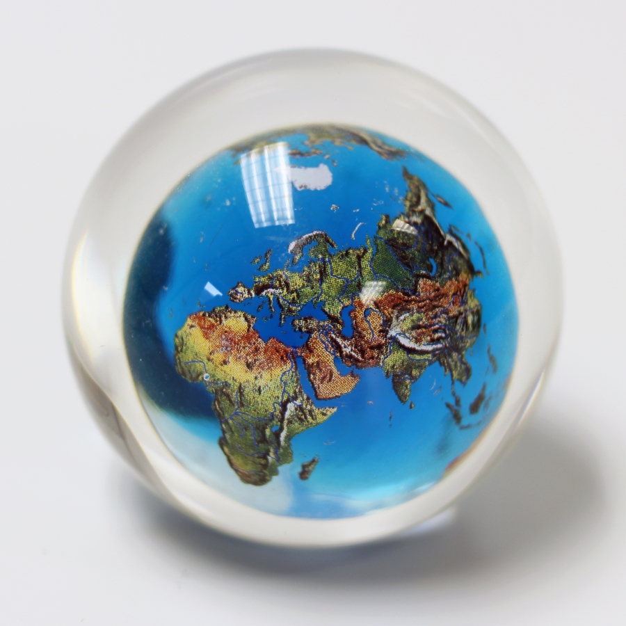 World globe embedded in Lucite sphere award