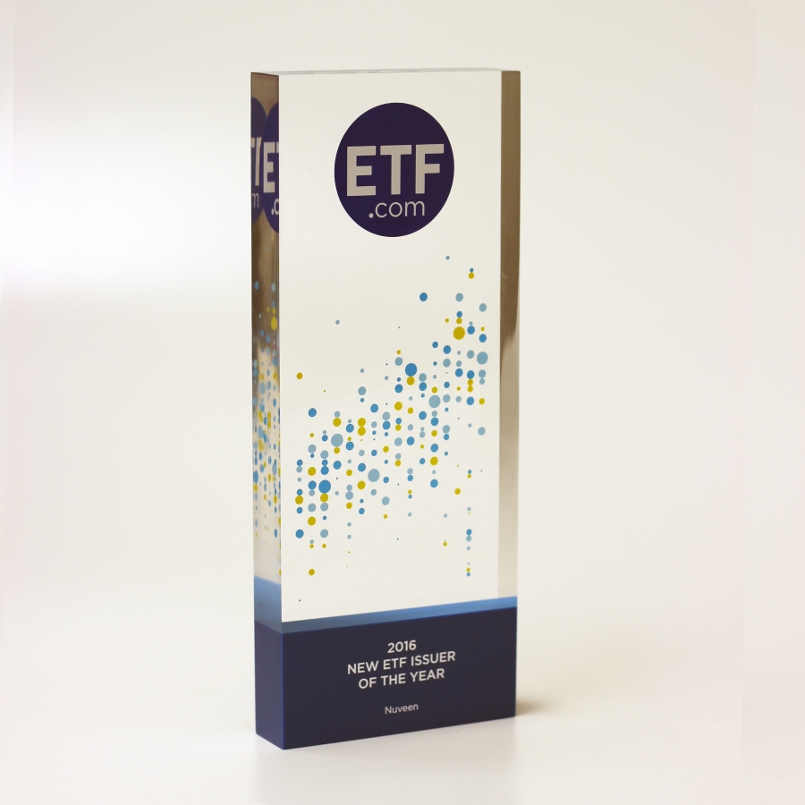Clear tower award on blue base with imprinted acetate embedment