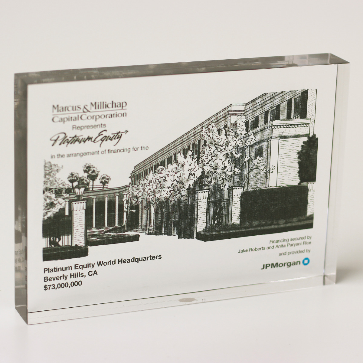Custom Lucite embedment trophy of classy building award