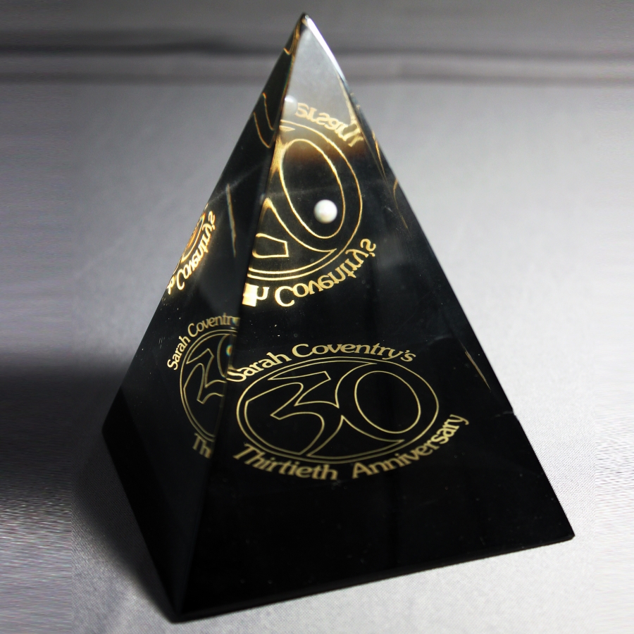 Custom shaped pyramid Lucite award with embedment