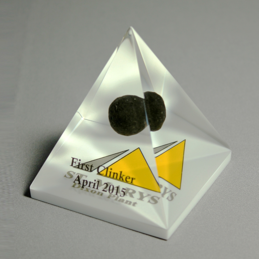 Custom shaped pyramid Lucite award with embedment