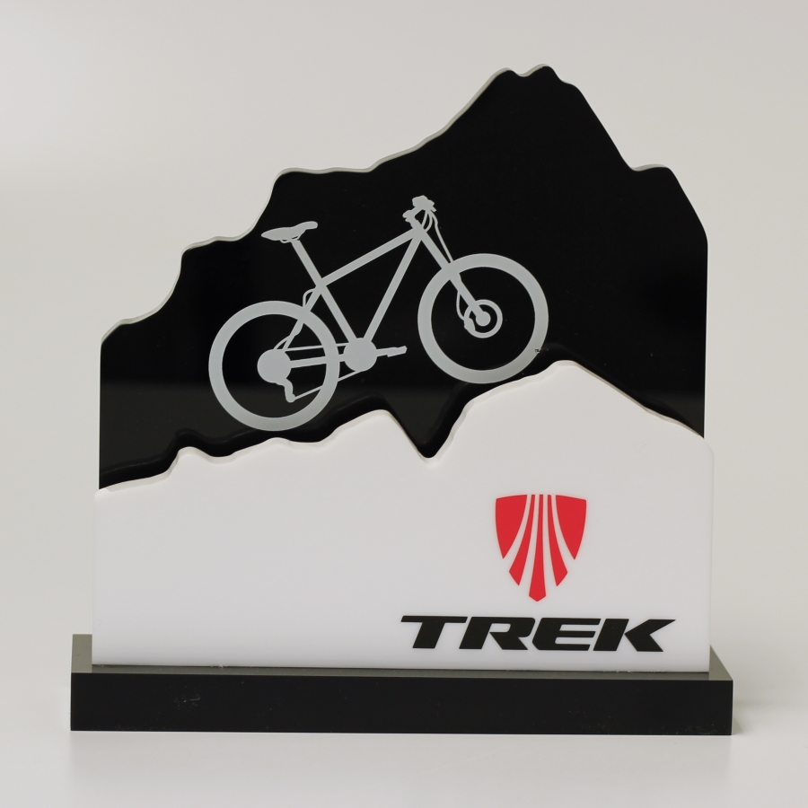 Two mountains and a bike make up this custom shaped trophy or display