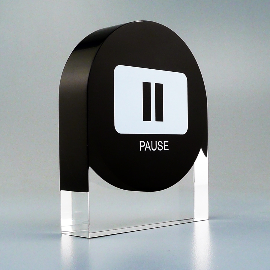 Pause button made out of Lucite trophy or gift