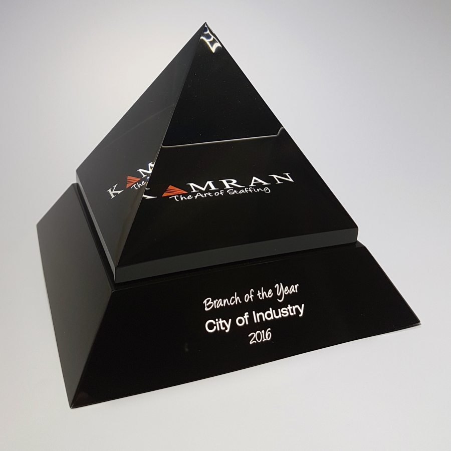 Spinning black pyramid award or trophy