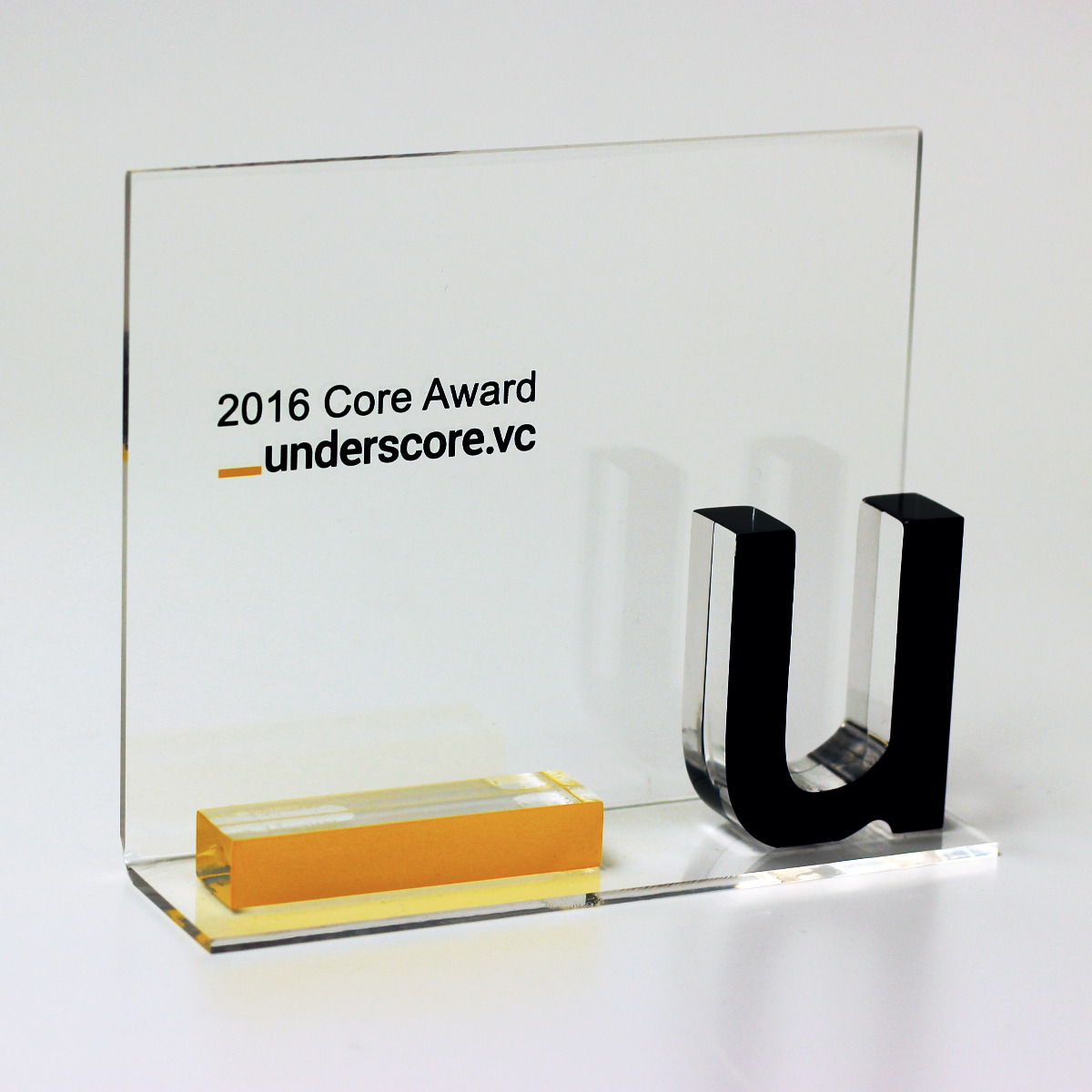 Custom shaped award or display with underscore as a theme