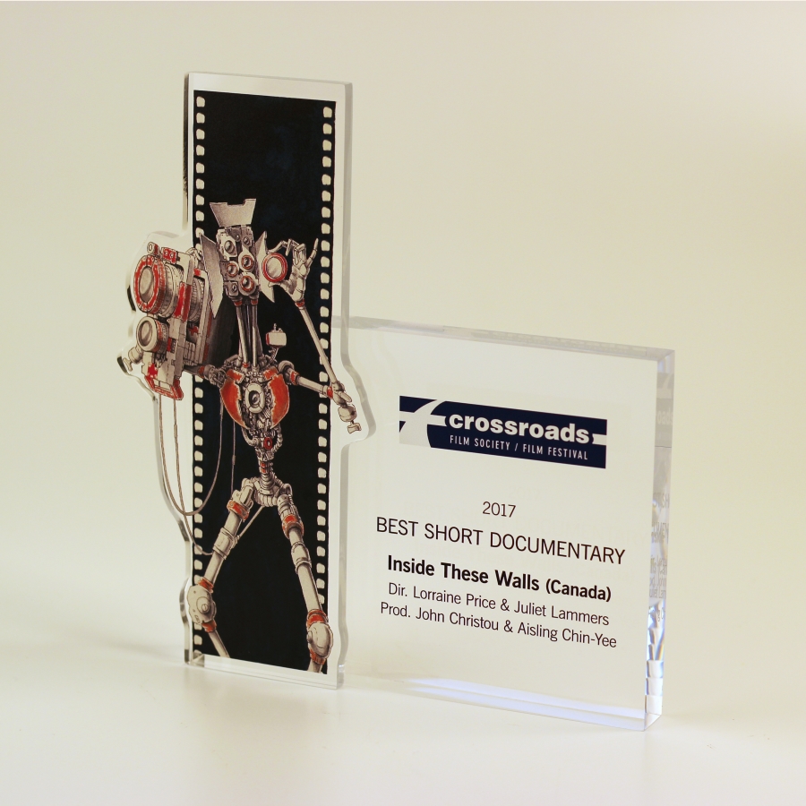 Custom shaped film strip award and area for message.