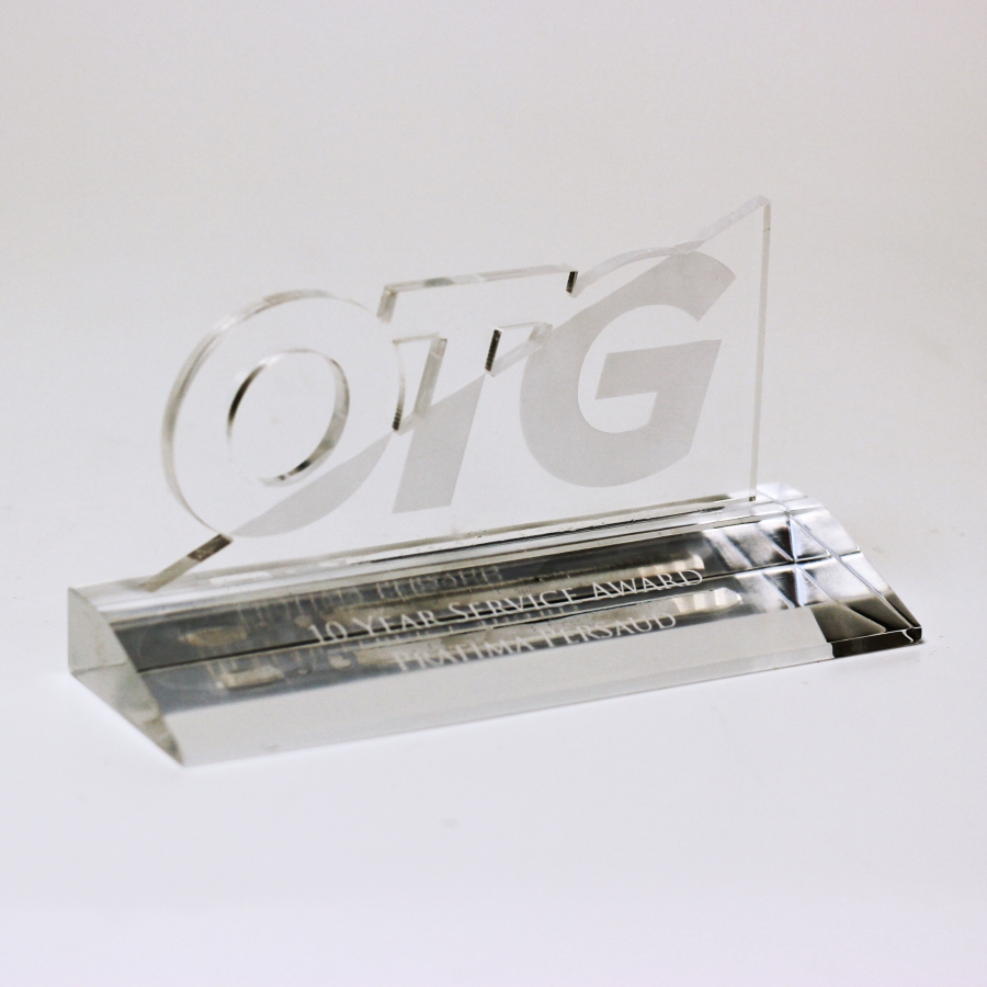 Custom shaped service award with logo cut out