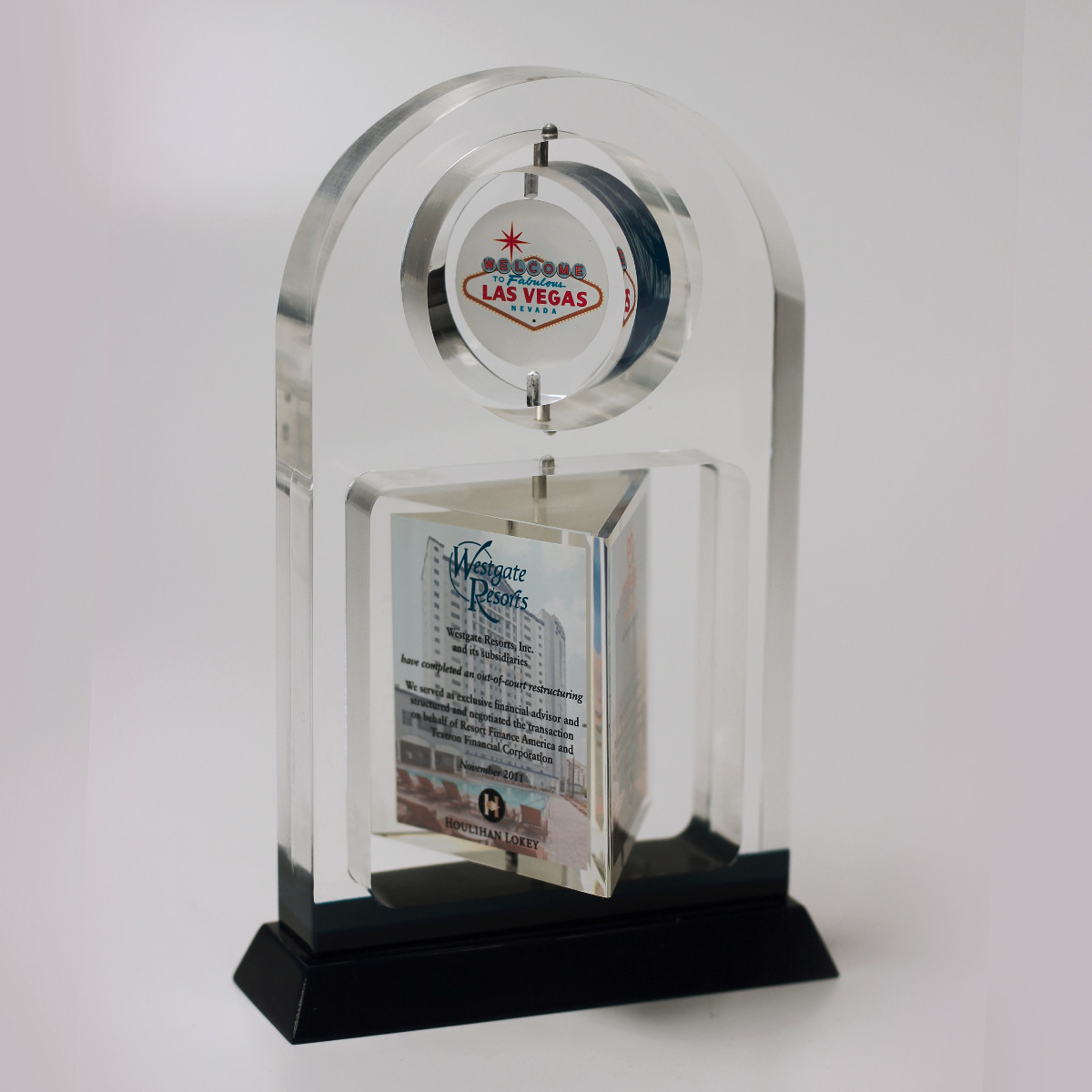Custom shaped double spinner interactive Lucite motion awards